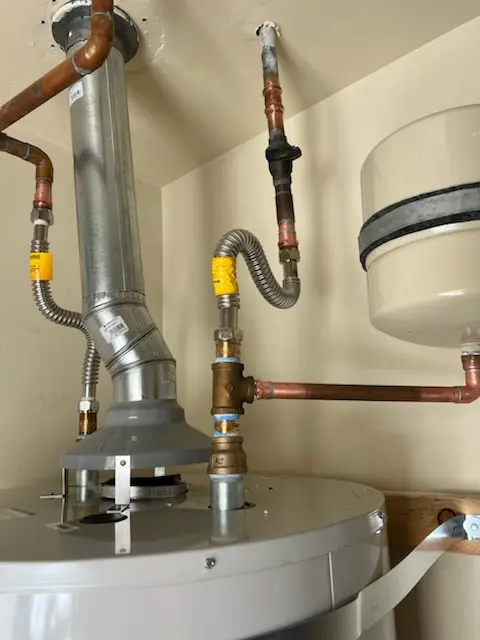 Water heater installation and plumbing repair in Enchanted Lake Estates